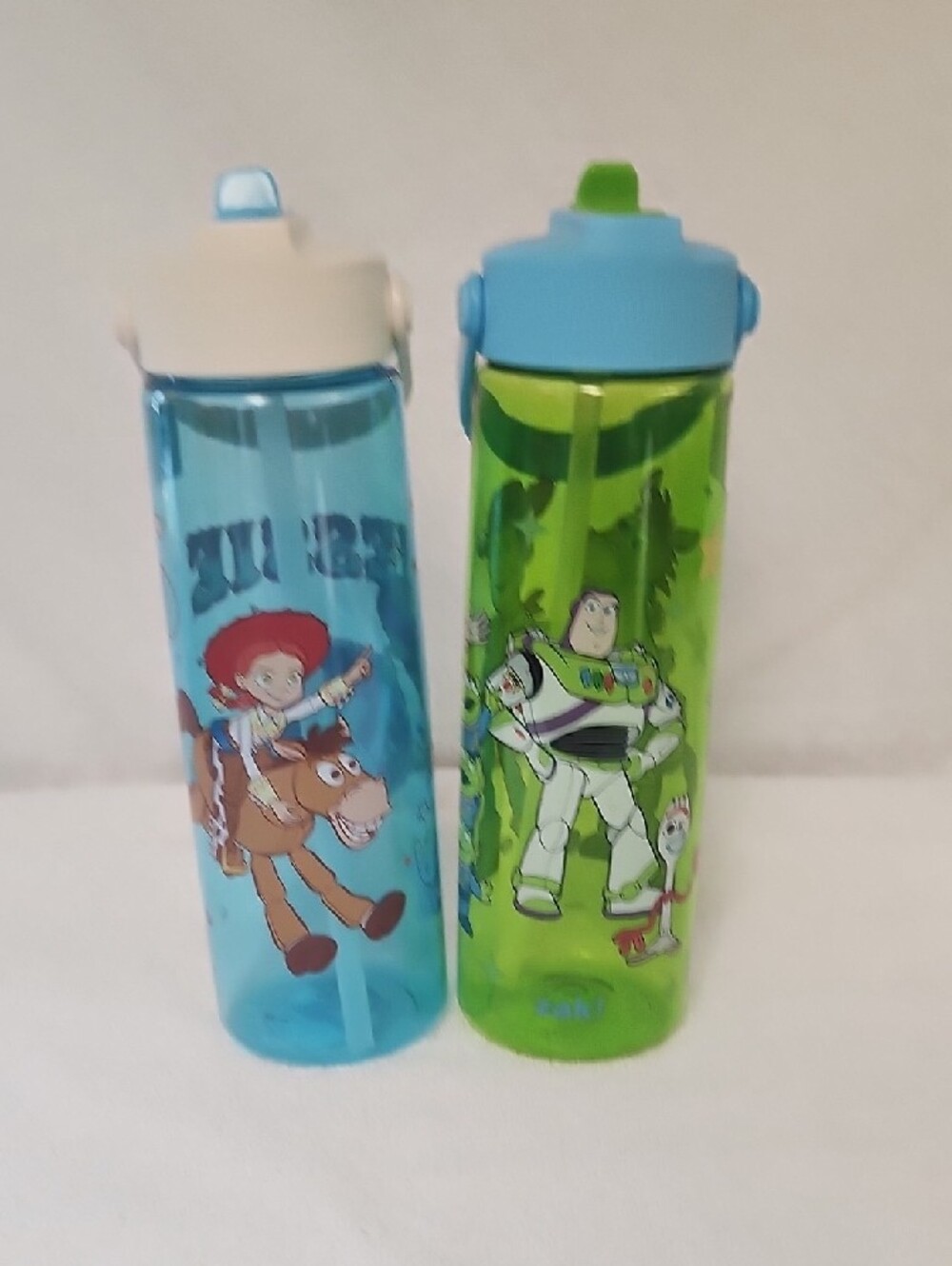2 Kids' Toy Story Woody And Jessie Flip-Spout Water Bottles — Blue and Green - Picture 3 of 7